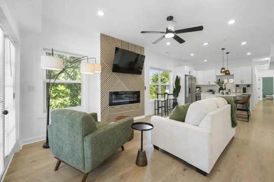 Handyman Atlanta | Reliable Home Repair & Improvement. 1 Handyman Atlanta – Above All Handyman living room renovation at 1498 Murphy Ave SW featuring modern fireplace, mounted TV, and open concept design.