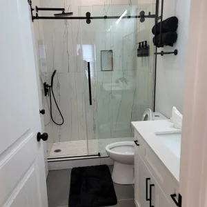 above-all-handyman-local-handyman-atlanta-bathroom-remodel-murphy-ave Local Handyman Atlanta project – Above All Handyman transformed this bathroom with a modern glass shower, tile finishes, and a new vanity
