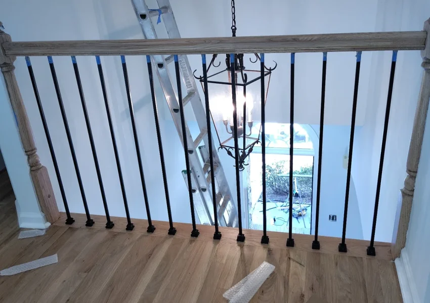 New hardwood flooring and custom handrail installation with fresh interior paint – 3 Renfroe Ct Decatur GA | Above All Handyman